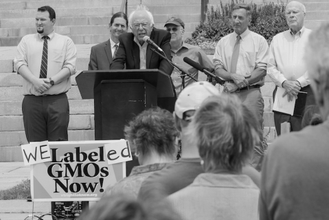 Sen. Bernie Sanders (I-Vt.) joined other elected officials and activists on July 1 to celebrate the start of Vermont’s new law requiring labeling of genetically modified foods. The achievement would prove short-lived, as Congress voted later in July to nullify the Vermont law and any others like it.   (Photo: Roger Crowley / Vermont Public Interest Research Group)